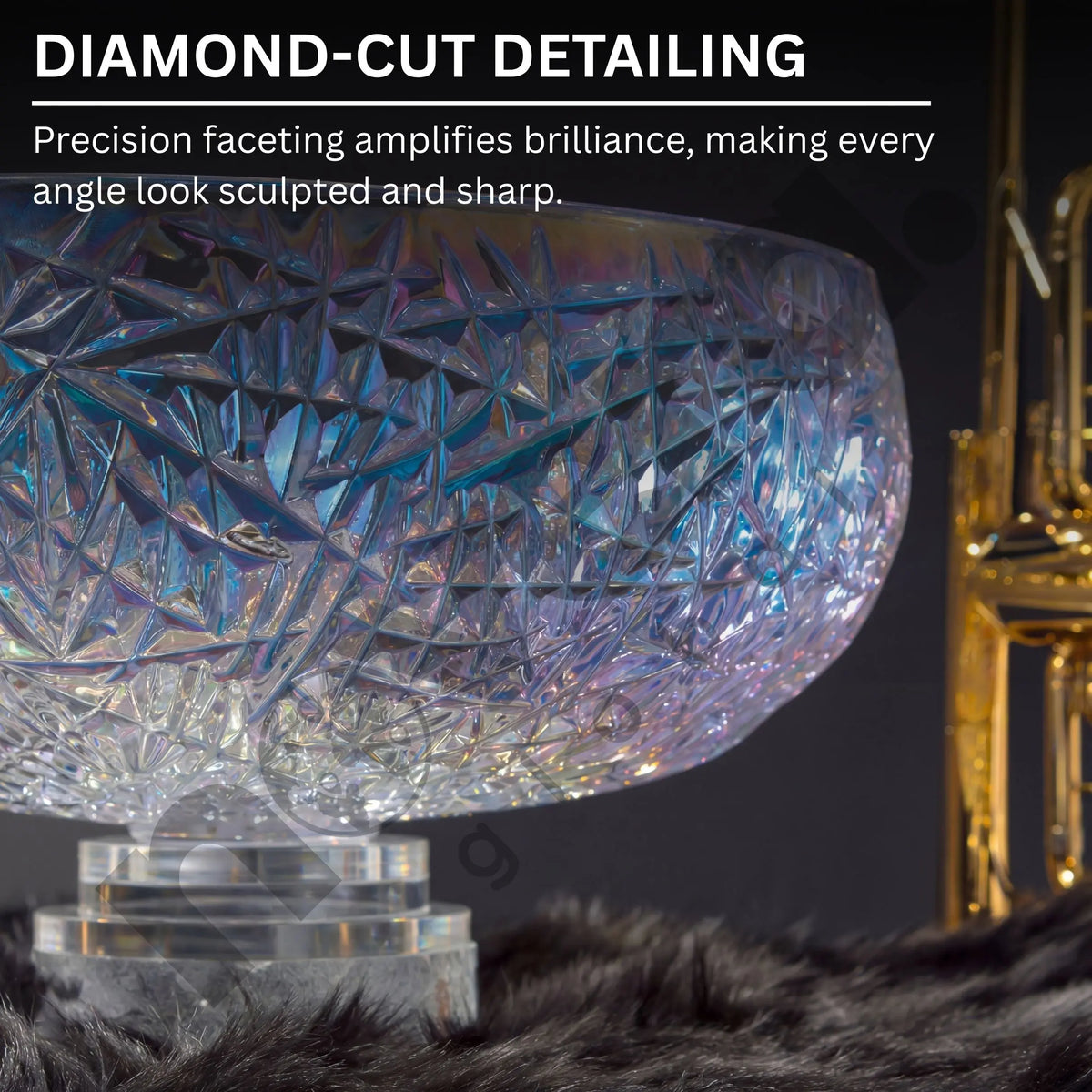 Close-up of a crystal object with diamond-cut detailing on a dark background