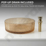 Glass sink basin with gold pop-up drain on a white background