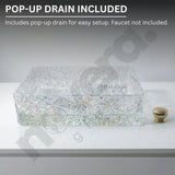 Decorative glass sink basin with pop-up drain on a gray background