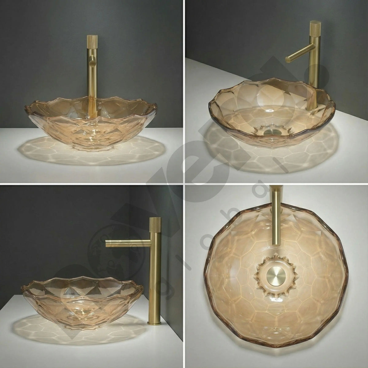 Glass sink with gold faucet on a gray background