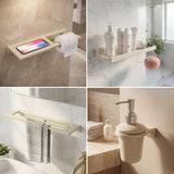 Bathroom accessories including a shelf with a phone, toilet paper, and soap dispenser.