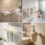 Bathroom accessories including a shelf with a phone, toilet paper, and soap dispenser.
