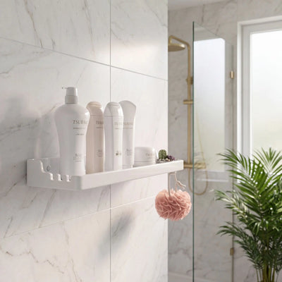 Bathroom with white shelves holding skincare products, a shower, and a plant.