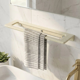 Towel rack with a towel hanging on it in a bathroom setting