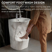 Person washing feet in a marble-patterned foot wash basin with text about comfort and ease of use.