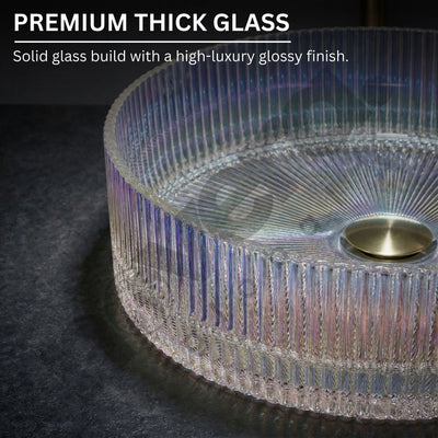Glass table with ribbed design and gold base on a dark surface, highlighting premium thick glass quality.