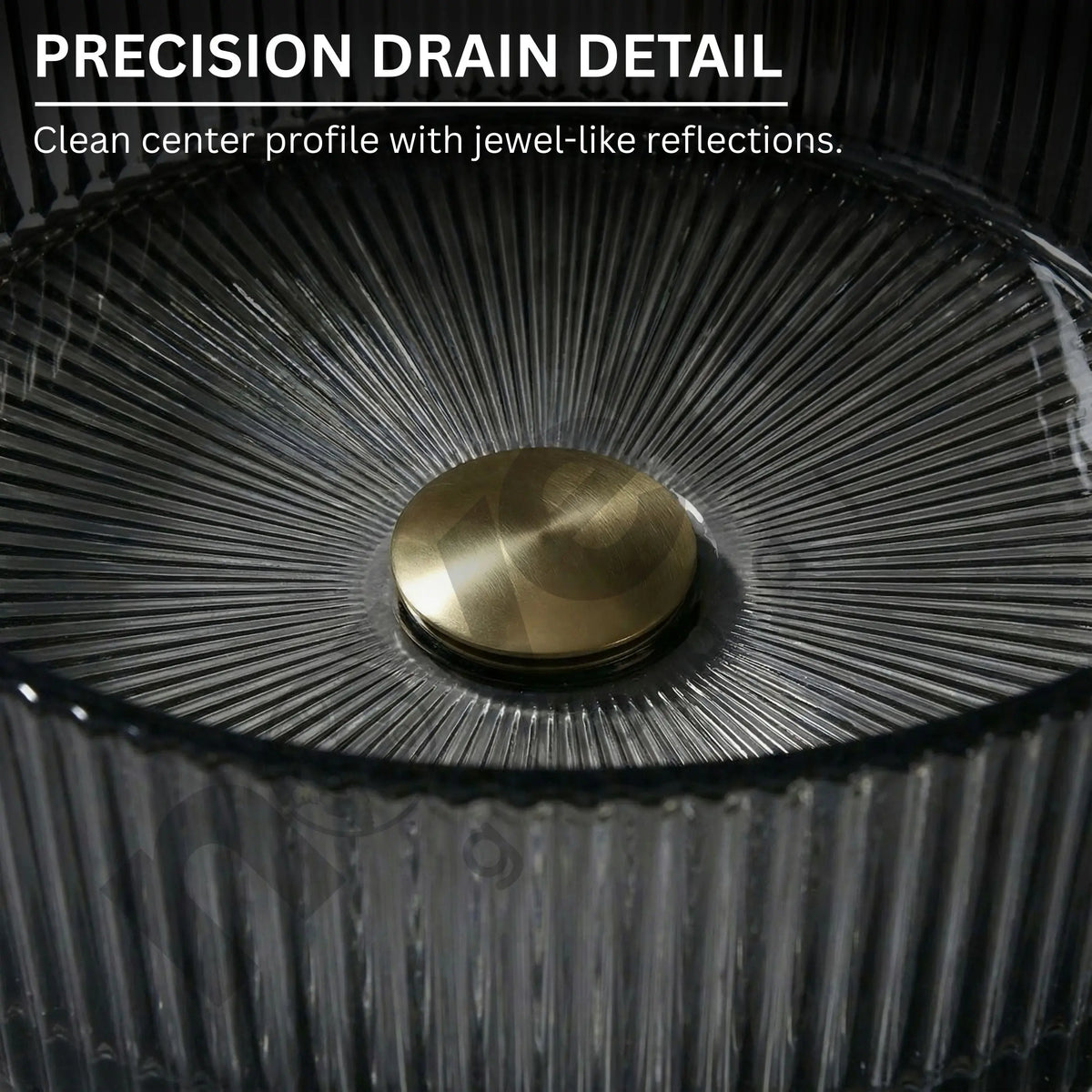 Close-up of a precision drain detail with a gold center and textured black surface.