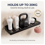 Black shelf holding bottles and a kettlebell with text about its strength capacity.