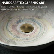 Handcrafted ceramic art piece with a gold center and multicolored glaze.