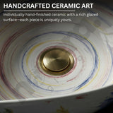 Handcrafted ceramic art piece with a rich glazed surface and gold center.