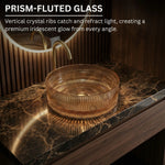 Prism-fluted glass bowl on a marble surface with text describing its features.