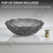 Glass basin with pop-up drain on a gray background