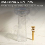 Glass sink with gold drain on a light background, featuring text about a pop-up drain.