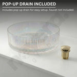 Clear glass sink basin with gold pop-up drain on a white background