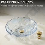 Clear glass sink basin with gold faucet on a white background, featuring text about a pop-up drain.