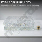 Decorative glass sink basin with pop-up drain on a gray background