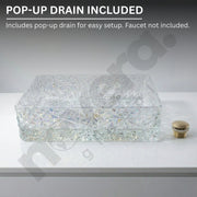 Decorative glass sink basin with pop-up drain on a gray background