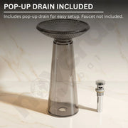 Clear shower drain with pop-up mechanism on a marble background